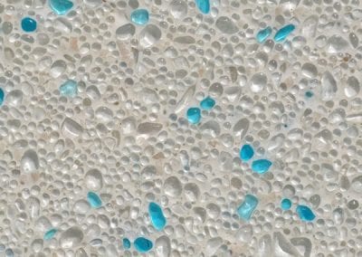 Cream-grey stone with blue topaz flecks